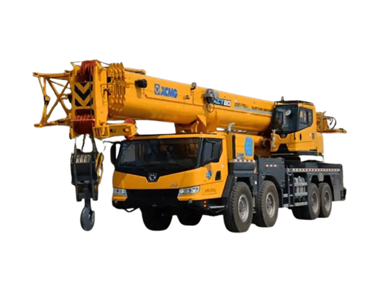 XCMG crane maintenance technician using manual